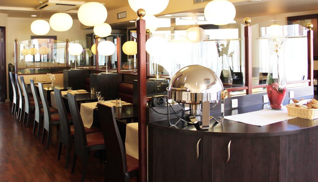 Kyriad Prestige Hotel 4*